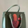large green doll tote bag