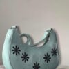 light green embroided handbag