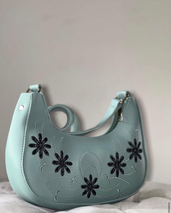 light green embroided handbag